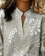 Floréa | Blouse Fleurie à Col Montant Élégant