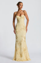 Louise – Robe longue ajustée sans manches avec bretelles à ruban floral