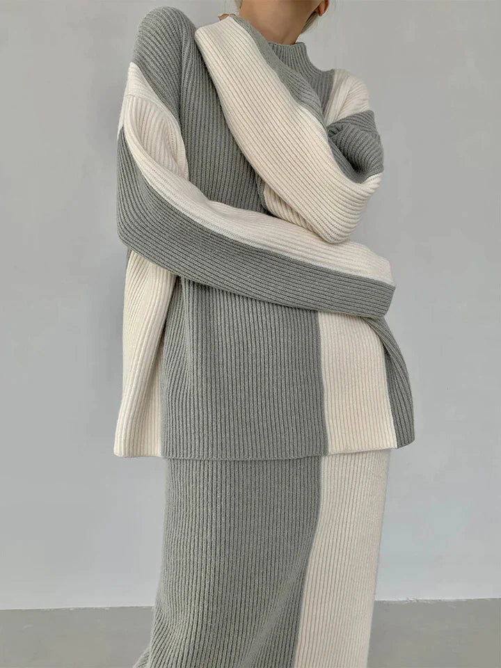 Kathy Limited Edition Knitwear – Asymmetrische damestrui in zwart-crème design